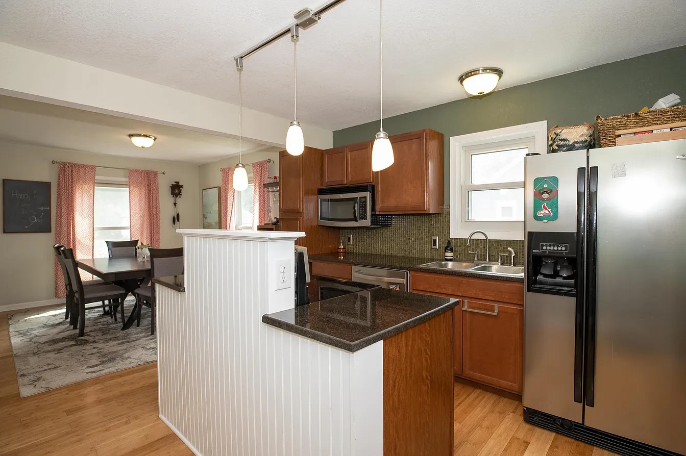 Kitchen — modern cabinetry with white island